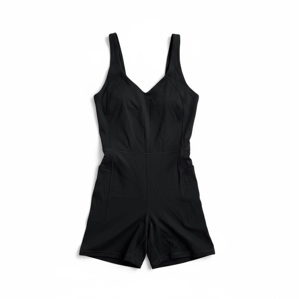 Calia Women's Inspire Pure Black Bodysuit size S 5 Inch Inseam w/ Pockets UPF 50
